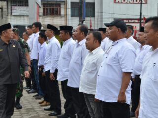 Irsan Efendi Nasution Pimpinan Apel Gelar Pasukan Pengamanan Pilkades Serentak tahun 2023.